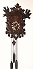  C.1900, German, 30-hour Cuckoo and Quail wall clock, with 3 weights, all carvings of oak. 