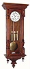  C.1895, German, Junghans, Grand Sonnerie, 3-Wt wall clock, in a walnut case, with carved Corinthian half columns to the side, in the Alt Deutsch style. 