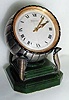  C.1955, Swiss, Zenith Watch Co., for TIFFANY and CO., round, rim wind, desk clock with its original "4-Cobra" stand, brass and gilt cobras on a jade base. 
