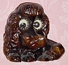  C.1950, German, Oswald, cast composition FRENCH POODLE, one day spring wound timepiece novelty. 