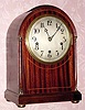  C.1910, German, 8-day Westminster chime mantel clock, round gothic design. 