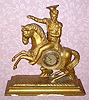  C.1815, Austrian, Gilt Wood Mantel Clock, a royal figure on horse back, 3-Tr, Grand Sonnerie, 1-day duration. 