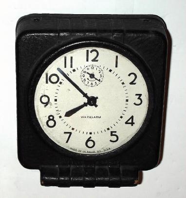 C. 1943, Westclox, LaSalle, IL, WAR ALARM, made of pressed, molded paper, painted with dull crinkle finish. — Antique Clocks Price Guide