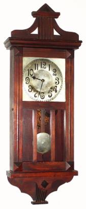C.1920, William L. Gilbert Clock Co., "No. 3040 - Ulster", 8-day time and gong strike wall clock. — Antique Clocks Price Guide