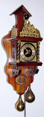 C.1965, German, re-issue of the Dutch Zaanse clock, 2-weight, 8-day, surmounted by a figure of Atlas holding the world. — Antique Clocks Price Guide