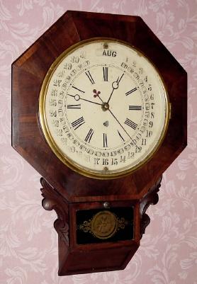 C.1870, Mixed Lot: Ansonia drop octagon case, now with Ingraham timepiece calendar movement, and Gilbert dial made to Maranville patent, 8-day. — Antique Clocks Price Guide