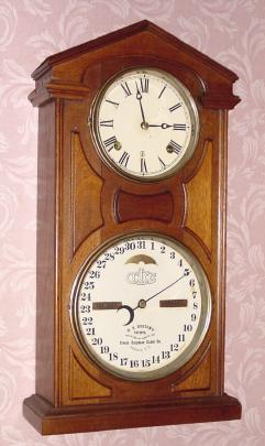 C.1874, Ithaca Calendar Clock Co., "No. 7 Shelf Cottage", 8-day time +strike double dial, perpetual calendar clock. — Antique Clocks Price Guide