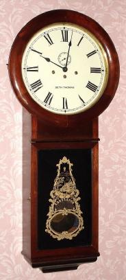 C.1980, Seth Thomas Clock Co., Div. of General Time Corp., A Tally Industries Co., "Regulator No. 2" 8-day triple chime mahogany wall clock. — Antique Clocks Price Guide