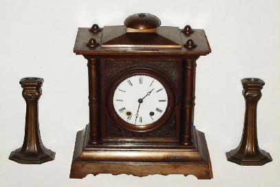 C.1872, Seth Thomas' Sons and Co, New York, "No. 4 Tucker Bronze", 15-day time/strike mantel clock with a pair of candle sticks. — Antique Clocks Price Guide