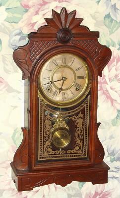 C.1881, E. Ingraham and Co., "Pheonix", 8-day time/strike mantel clock. — Antique Clocks Price Guide