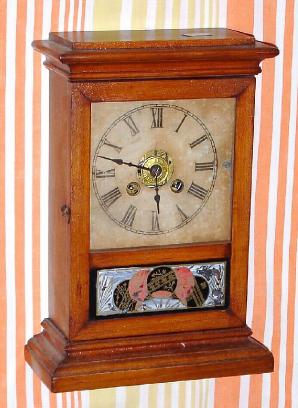 C.1890, German-American, 30-hour time/alarm cottage timepiece. This is German copy of a Waterbury Clock Co. style case. — Antique Clocks Price Guide
