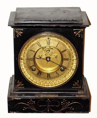 C.1891, Waterbury Clock Co., "Reno", 8-day time and strike enameled iron case mantel clock. — Antique Clocks Price Guide