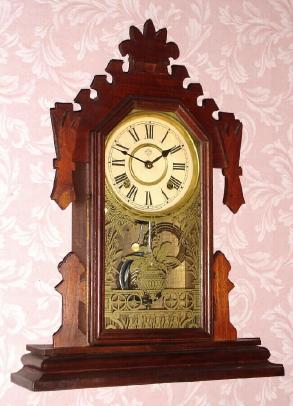 C.1890, Ansonia,"ATLAS", Walnut cased gingerbread clock, 8-day time and gong strike. — Antique Clocks Price Guide