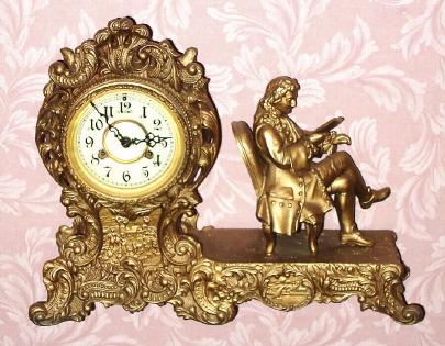 C.1905, Waterbury Clock Co., "Voltaire", 8-day time/strike figural mantel clock. — Antique Clocks Price Guide