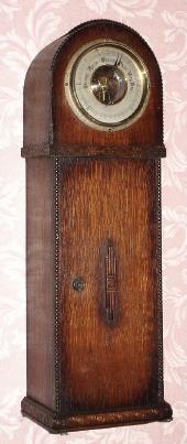 C.1930, English, Oak case and Aneroid barometer with a storage area below. — Antique Clocks Price Guide