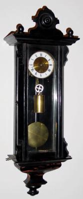 C.1860, Austrian, 1-weight Timepiece, in a transitional case, ebonized, one-to-two-day duration. — Antique Clocks Price Guide