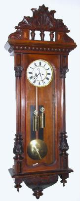 C.1875, Austrian, 2-Wt, Vienna Regulator, 8-day, in a walnut case with old top and finials. — Antique Clocks Price Guide