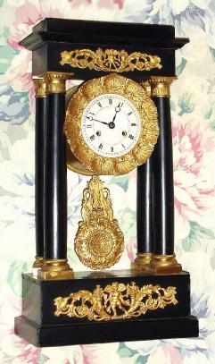 C.1870, French, Empire style 8-day, time and bell strike 4-column portico shelf clock. — Antique Clocks Price Guide