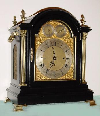 C.1890, English, Triple Fusee Bracket Clock, ebonized mahogany case with brass OG feet and flame finials, playing your choice of Whittington or Cambridge tunes on the quarter hour. — Antique Clocks Price Guide