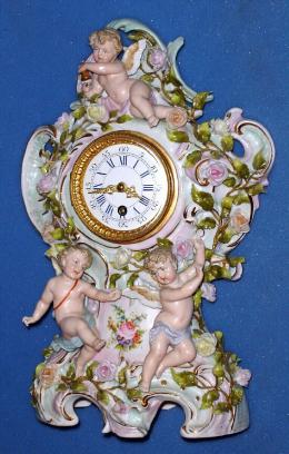 C.1880, German, Lenzkirch, Porcelain china clock, love themes and 3 winged cupids, 8-day timepiece. — Antique Clocks Price Guide