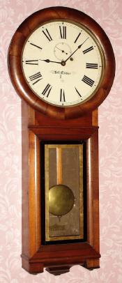 C.1865, Seth Thomas, an Early "Regulator No. 2" in walnut, with side hung lead weight with baffle and uncommon tablet, 8-day. — Antique Clocks Price Guide