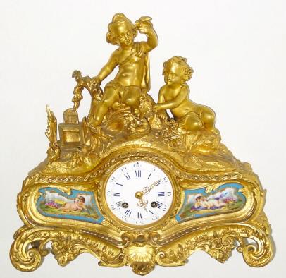 C.1855, French, Japy for Rollin a'Paris, ormolu figural clock with accent panels, children playing with their pet birds. — Antique Clocks Price Guide