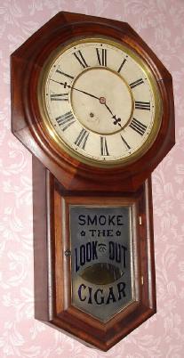 C.1900, Ansonia Clock Co., Regulator A, timepiece, advertising "Smoke the Look Out Cigar". — Antique Clocks Price Guide