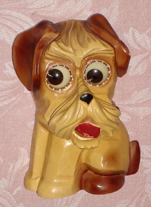 C.1935, German, Oswald "Yorkshire Terrier" rotating eye timepiece,molded composition body. — Antique Clocks Price Guide