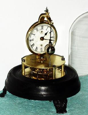 C.1878, Unsigned, but by either G. W. Brown or Welch Mfg. Co., 30-hour "Briggs Rotary" novelty timepiece with dome. — Antique Clocks Price Guide