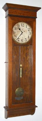 C.1911, New Haven Clock Co., STANTON REGULATOR, single weight, full length, seconds beating wall clock in oak. — Antique Clocks Price Guide