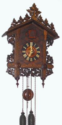C.1900, American Cuckoo Clock Co., Philadelphia, nice inlaid cuckoo with original rack of leaves. 2-wt, 30 hour. — Antique Clocks Price Guide