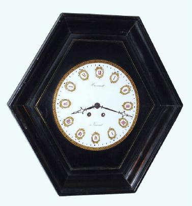 C.1885, French, Huveault, a' Vineuil, large picture frame clock, unusual hexagon shape, and with 12" [31cm] porcelain dial with individual signet numerals on gilt shields. — Antique Clocks Price Guide