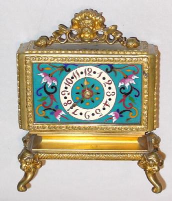 C.1900, French, Pons, Fancy Enameled boudoir or desk timepiece, ormolu, with dragon tongue feet and a dragon mask at the top. — Antique Clocks Price Guide