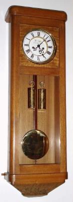 C.1915, German, Gustav Becker, 2-weight box clock, with retailer on dial B Ausich, Neubaugurtel, XV, Wien [painted name is weak]. — Antique Clocks Price Guide