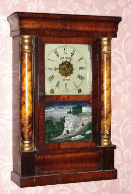 C.1860, New Haven Clock Co., 8-day time and gong strike miniature column and cornice shelf clock.This clock was exported to England and ended up in Dublin (on dial and repair label inside). — Antique Clocks Price Guide