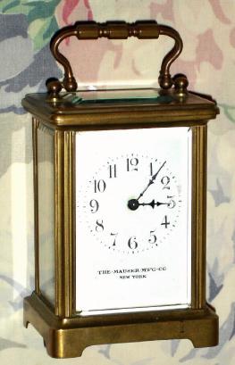 C.1910, French, Brass Cased Carriage  timepiece, in a souvenir style Obis case [pressed brass], and with cylinder platform intact, retailed by The Mauser Mfg. Co, New York. — Antique Clocks Price Guide