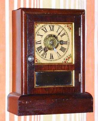 C.1865, Seth Thomas Clock Co., "Cottage E", 30-hour time/alarm rosewood cottage timepiece. — Antique Clocks Price Guide