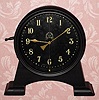 C.1921, English Gravity timepiece, The 30-hour movement is driven by a weight inside the case that is raised by a lever on the side with a visible escapement and a compound bar-bell pendulum, serial No. L3870. 