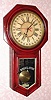 C.1901, Ansonia Clock Co., REGULATOR A - CALENDAR, as-found, now absent veneer and painted red and with grained over-coat. 