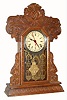 C.1907, E. Ingraham and Co., "Aurora", 8-day time, strike + calendar kitchen clock, in a deeply pressed oak case. 