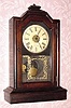 C.1980, China, 8-day time/strike/alarm shelf clock, using old ST movement. 