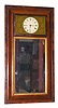 C.1847, George Hills, Plainville, Conn., time and strike reverse ogee mirror clock in a rosewood veneered case. 