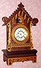 C.1866, (dated mov't) A. Frankfield and Co., New York, fretwork shelf cuckoo with Frankfield's modified Waterbury brass 8-day movement, dial and hands. 