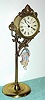 C.1895, Ansonia Clock Co., JUMPER No.1, one day novelty timepiece, original brass finish, with old doll. 