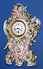 C.1880, German, Lenzkirch, Porcelain china clock, love themes and 3 winged cupids, 8-day timepiece. 