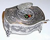 20th Century, German, Griesbaum, Singing Bird box, in an embossed Sterling Silver case, key wound, pull lever to activate. 