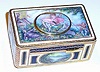 20th Century, German, Griesbaum, Singing Bird box, in a painted enamel and gilt brass trimmed case, key wound, slide lever to activate. 