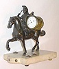 C.1810. French, Bronze on Marble Stand, the clock housed within a bronze drum, carried by a mounted soldier, in dress uniform. 
