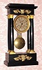 C.1850, French, 4-Column Empire style mantel clock, 8-day bell strike with grid pendulum. 