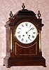 C.1890, French, Mougin, for the English Market, walnut cased bracket clock in the late Georgian style, with brass columns and finials, 8-day. 